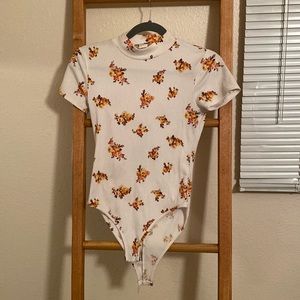 Marci medium floral turtle neck bodysuit